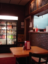 A case of Foxon Park sodas completes the classic takeout joint interior.